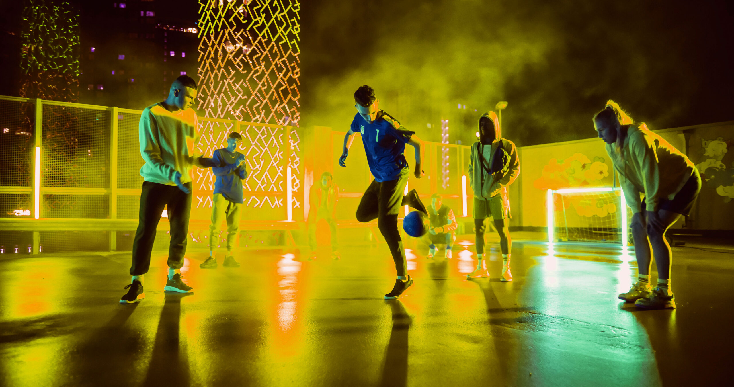 Young Soccer Athlete Performing Freestyle Tricks with a Ball. Fo Neon yellow lights abstracted over woman's face