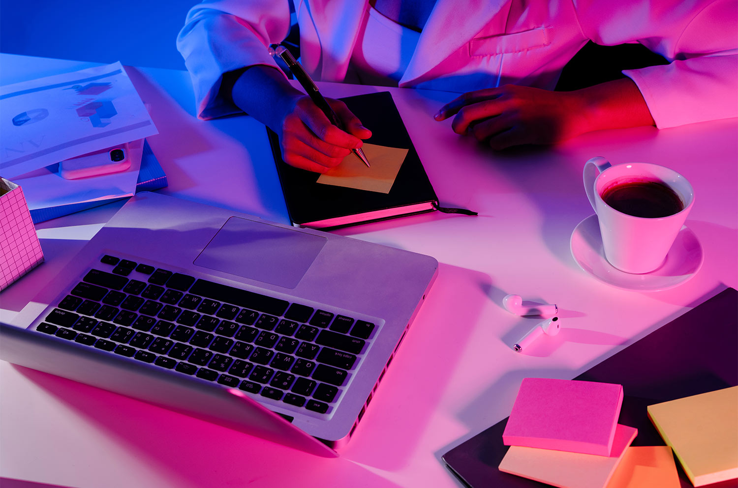 AdobeStock_390312361-1 Woman looking at phone yellow background and neon light effect